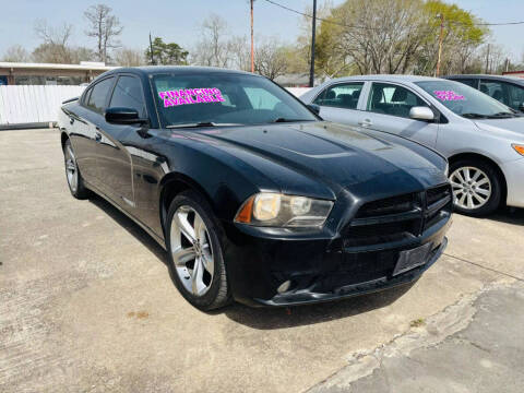 2013 Dodge Charger for sale at CE Auto Sales in Baytown TX
