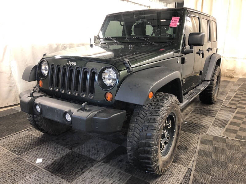 2011 Jeep Wrangler Unlimited for sale at Auto Works Inc in Rockford IL