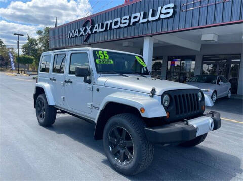 2012 Jeep Wrangler Unlimited for sale at Maxx Autos Plus in Puyallup WA
