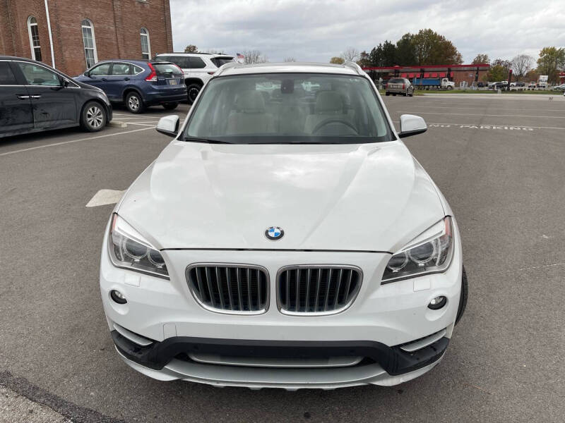 Used 2015 BMW X1 28i with VIN WBAVL1C50FVY35003 for sale in Etna, OH