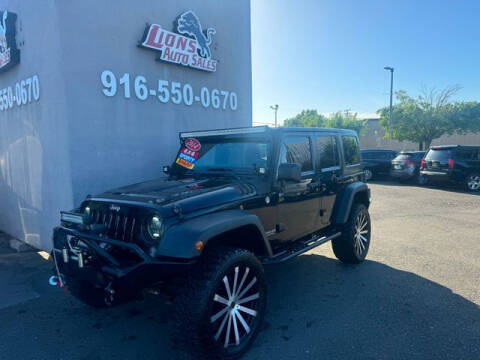 2014 Jeep Wrangler Unlimited for sale at LIONS AUTO SALES in Sacramento CA