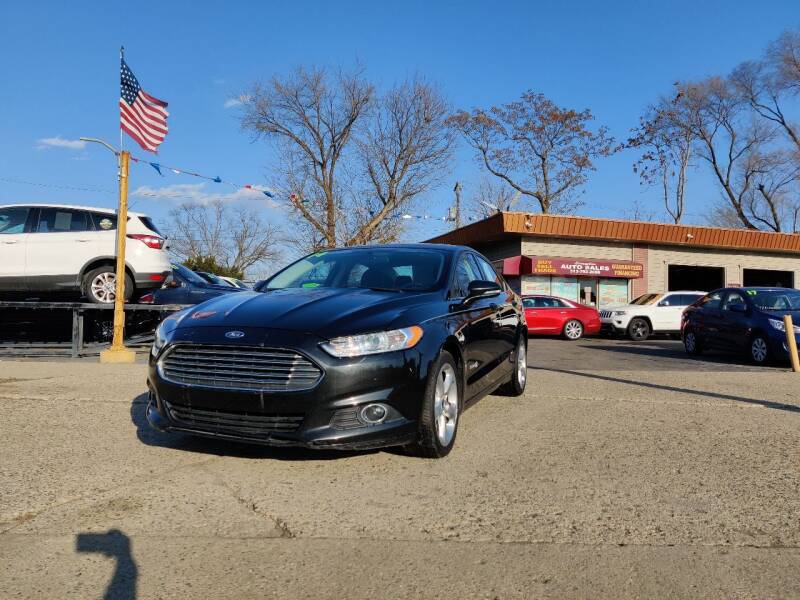 2014 Ford Fusion Hybrid for sale at Lamarina Auto Sales in Dearborn Heights MI