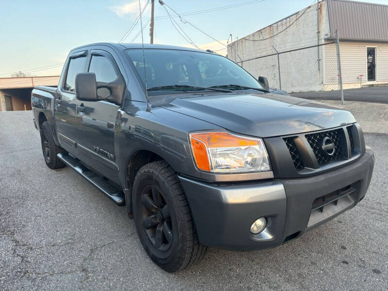 2014 Nissan Titan for sale at Delta Auto Sales in Marietta GA