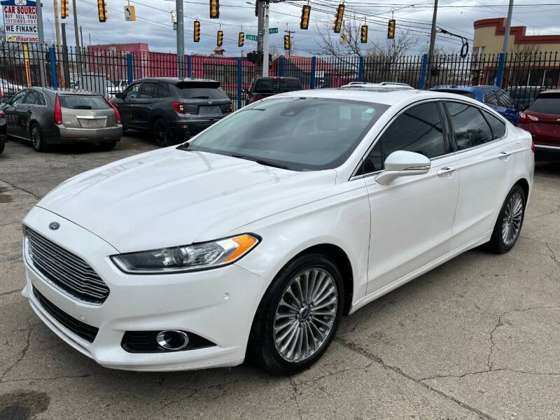 2013 Ford Fusion for sale at SKYLINE AUTO in Detroit MI