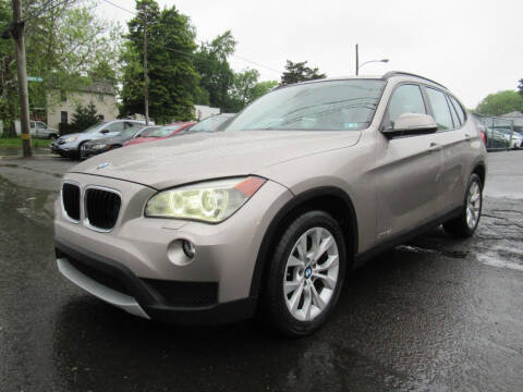 2013 BMW X1 for sale at CARS FOR LESS OUTLET in Morrisville PA