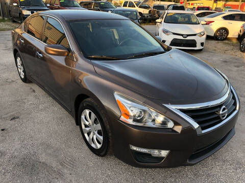 2015 Nissan Altima for sale at Marvin Motors in Kissimmee FL