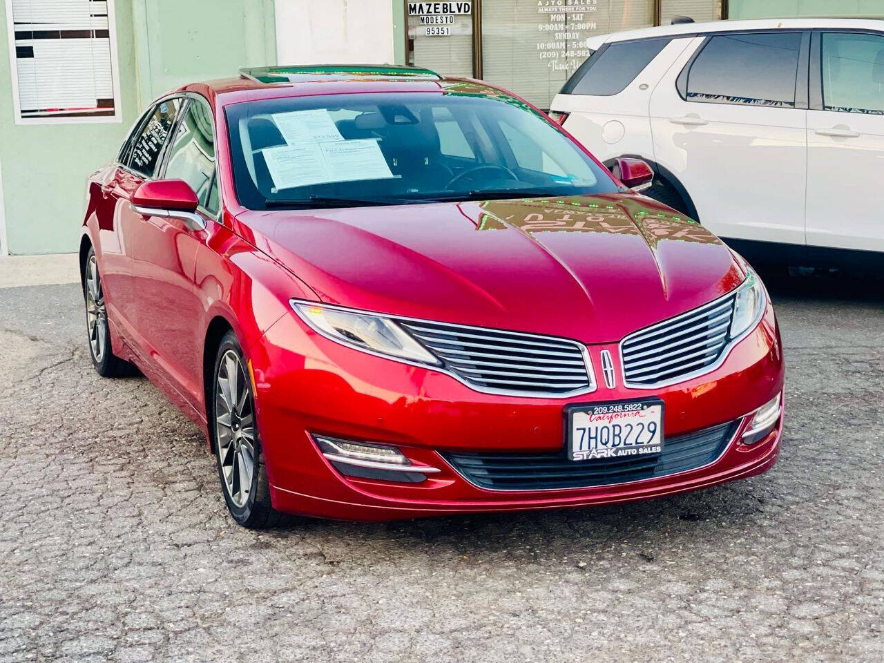 2015 Lincoln MKZ Hybrid for sale at STARK AUTO SALES INC in Modesto, CA