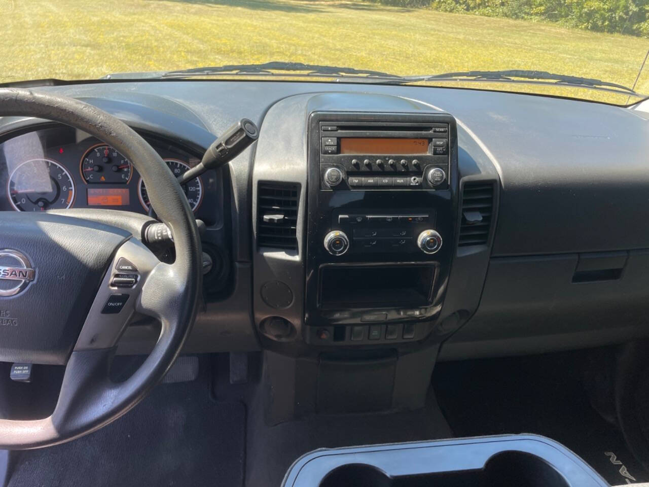 2013 Nissan Titan for sale at Russell Brothers Auto Sales in Tyler, TX