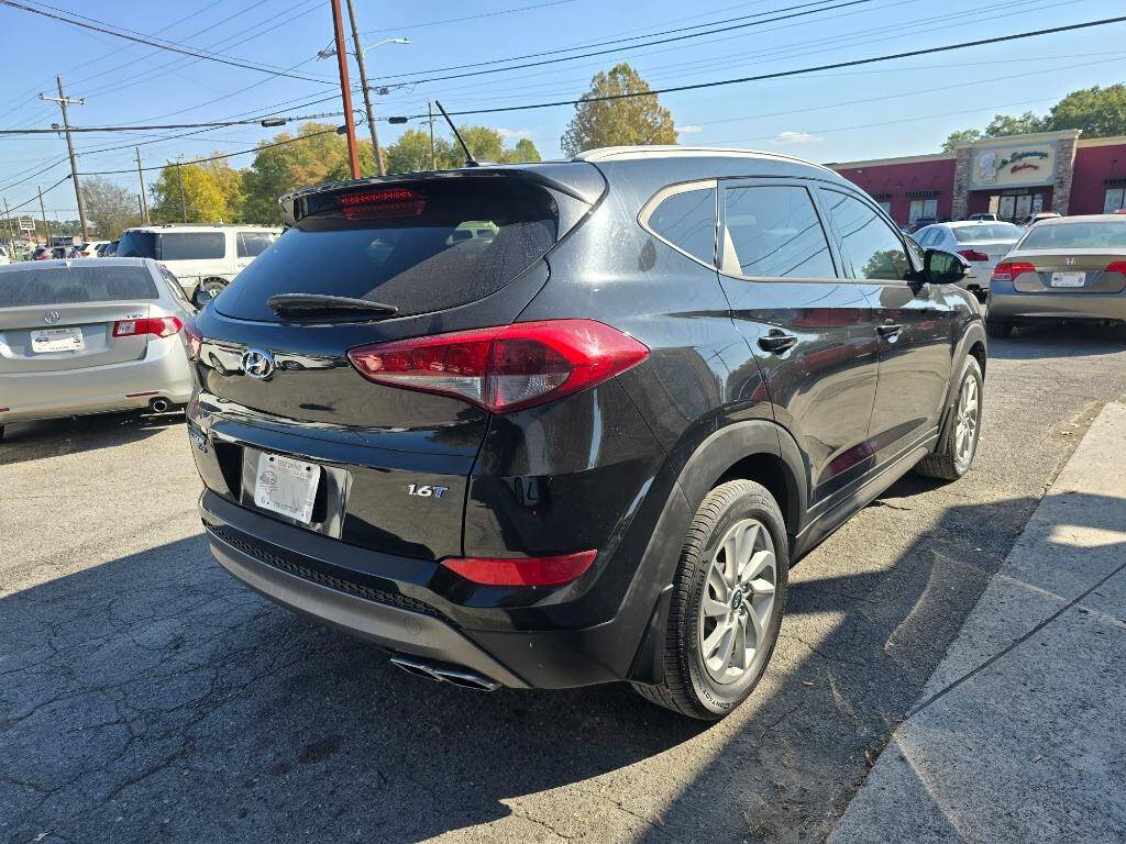 2016 Hyundai TUCSON for sale at DAGO'S AUTO SALES LLC in Dalton, GA