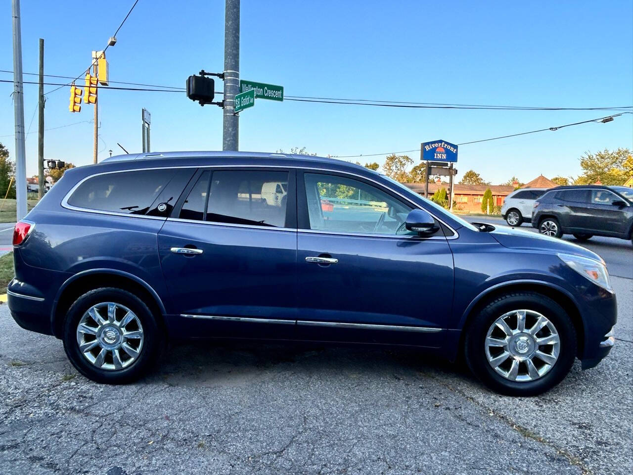 2014 Buick Enclave for sale at ONE PRICE AUTO in Mount Clemens, MI