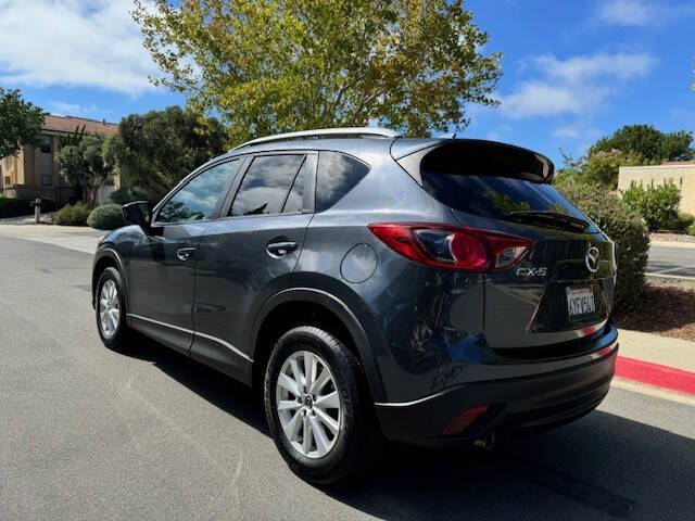 2013 Mazda CX-5 for sale at RGM Auto Sales in San Diego, CA