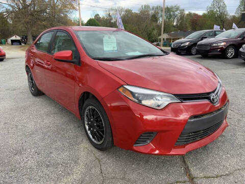 2016 Toyota Corolla for sale at MacDonald Motor Sales in High Point NC