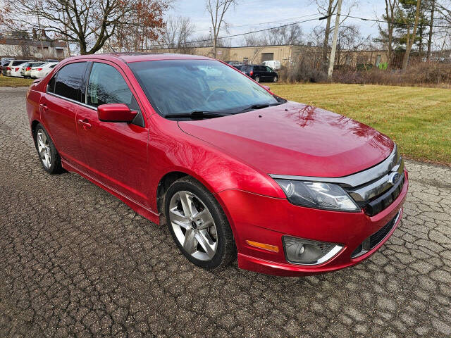 2011 Ford Fusion for sale at WAGNER AUTO MART LLC in Ann Arbor, MI