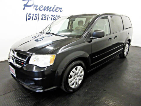 2014 Dodge Grand Caravan for sale at Premier Automotive Group in Milford OH