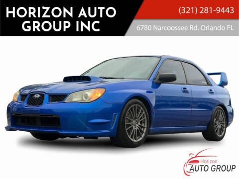 2006 Subaru Impreza for sale at HORIZON AUTO GROUP INC in Orlando FL