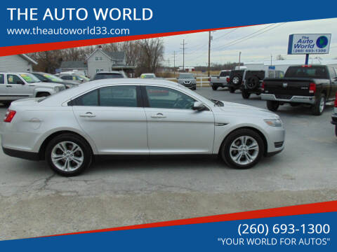 2014 Ford Taurus for sale at THE AUTO WORLD in Churubusco IN