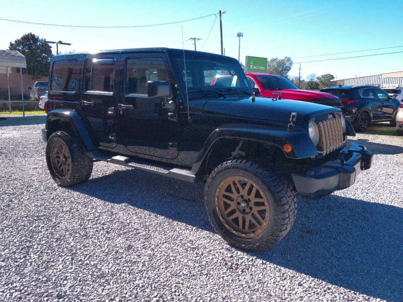 2014 Jeep Wrangler Unlimited for sale at PICAYUNE AUTO SALES in Picayune MS