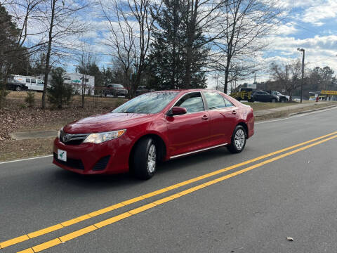 2014 Toyota Camry for sale at THE AUTO FINDERS in Durham NC