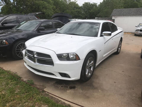 2011 Dodge Charger for sale at Simmons Auto Sales in Denison TX