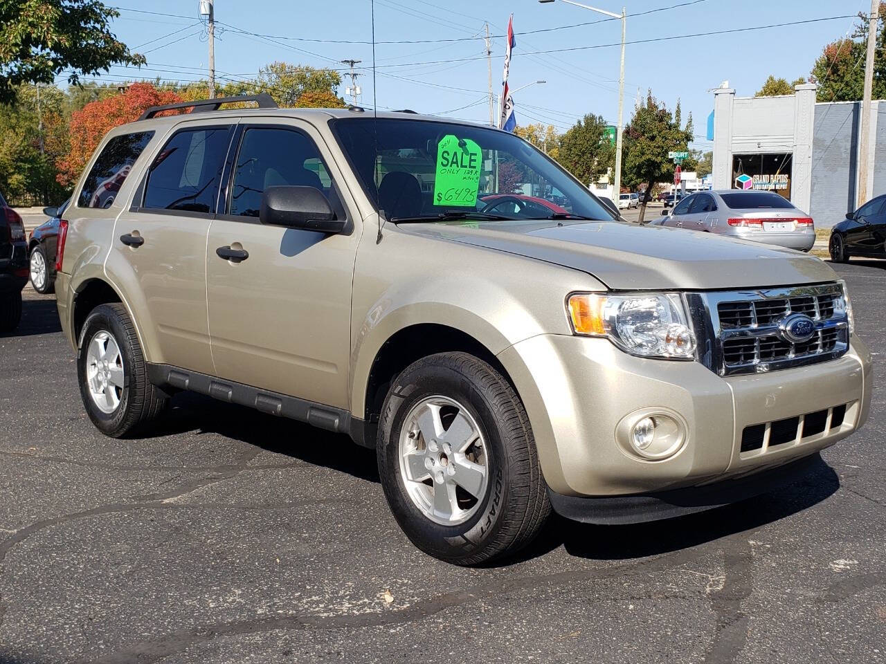 2011 Ford Escape for sale at Auto Shop in Wyoming, MI