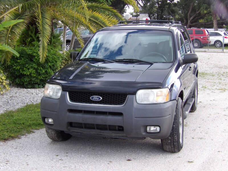 Used 2004 Ford Escape XLT with VIN 1FMYU93174DA20630 for sale in Fort Myers, FL