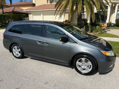 2013 Honda Odyssey for sale at Exceed Auto Brokers in Lighthouse Point FL