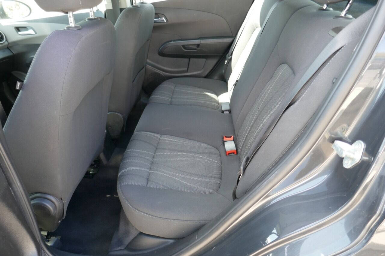 Preowned 2014 Chevrolet Sonic LT Auto 4dr Hatchback for sale by Crazy Cheap Cars in Oakfield, NY