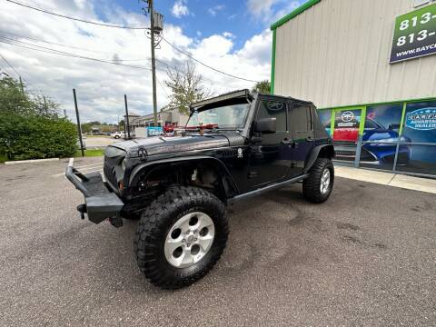 2014 Jeep Wrangler Unlimited for sale at Bay City Autosales in Tampa FL