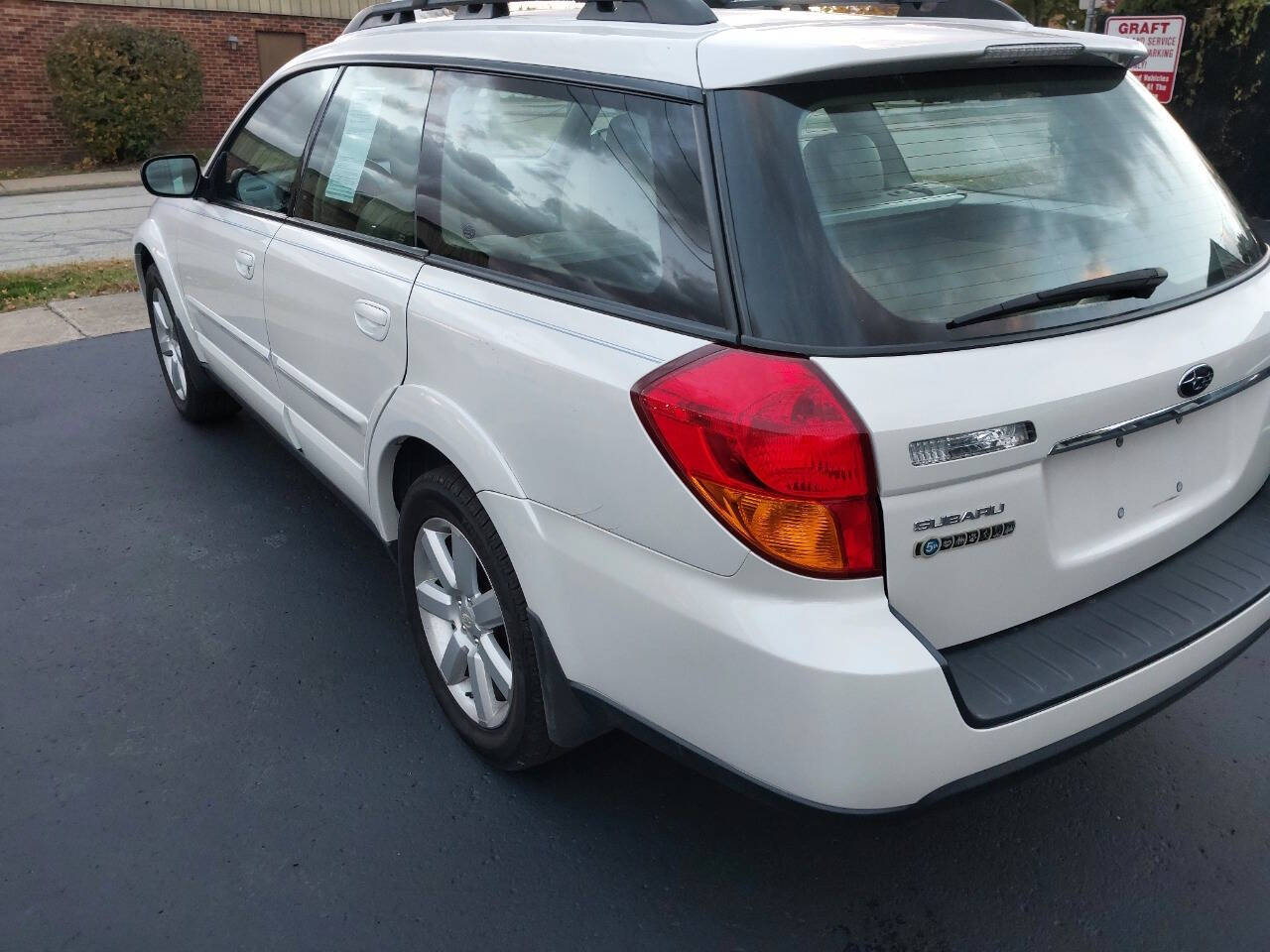 The 2006-2007 Subaru Impreza Wagon is a compact car offering all-wheel  drive and a versatile cargo space. It features a 2.5L engine and delivers  strong performance in both urban and off-road conditions, image size:1280x960