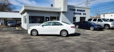 2011 Toyota Camry for sale at VINE STREET MOTOR CO in Urbana IL