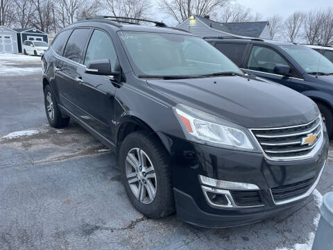 2016 Chevrolet Traverse for sale at HEDGES USED CARS in Carleton MI