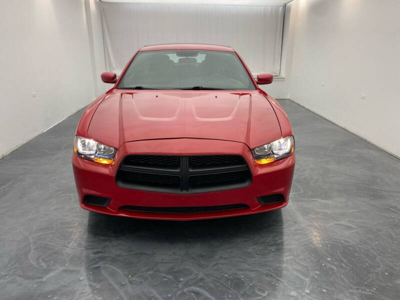 2013 Dodge Charger for sale at Roman's Auto Sales in Warren MI