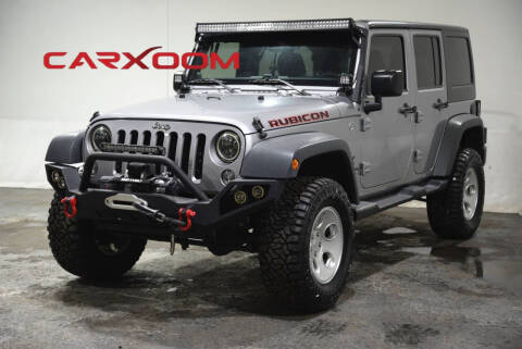 2014 Jeep Wrangler Unlimited for sale at CARXOOM in Marietta GA