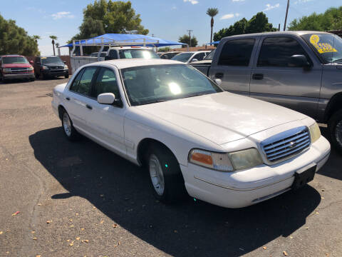 1999 Ford Crown Victoria for sale at Valley Auto Center in Phoenix AZ
