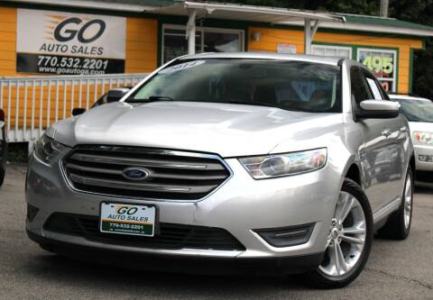 2014 Ford Taurus for sale at Go Auto Sales in Gainesville GA