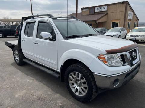 2010 Nissan Frontier for sale at BERKENKOTTER MOTORS in Brighton CO