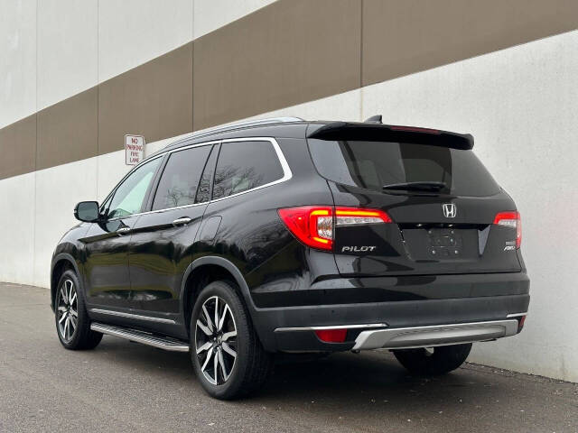 2021 Honda Pilot for sale at Phoenix Motor Co in Romulus, MI