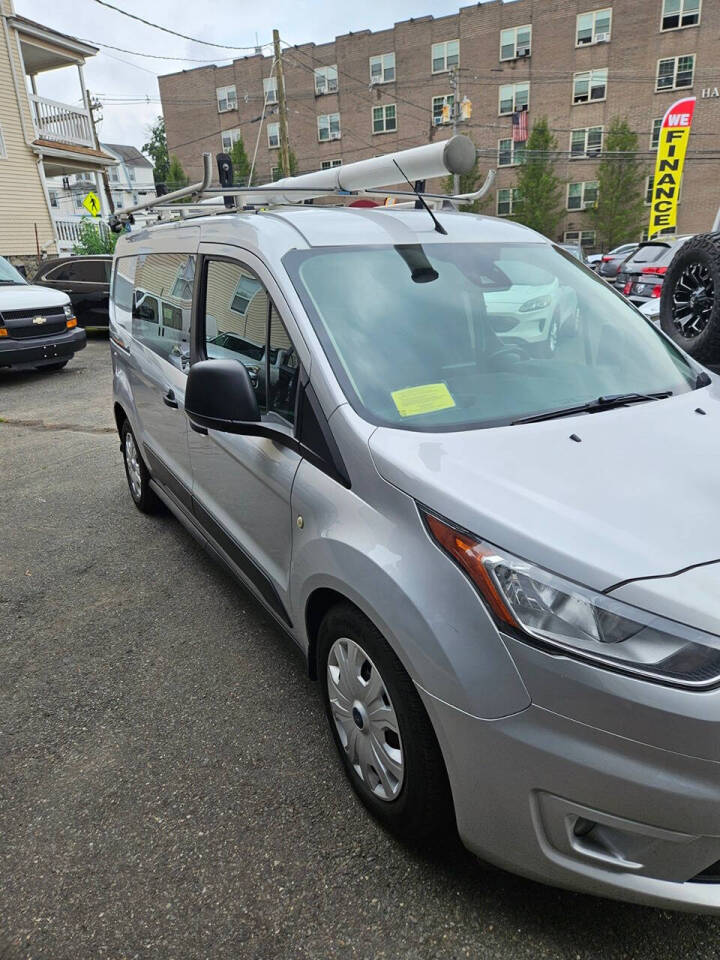 2019 Ford Transit Connect for sale at RENOS AUTO SALES LLC in Waterbury, CT