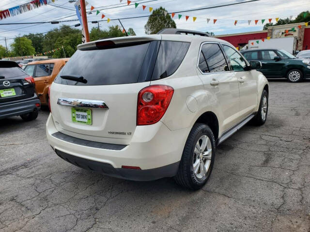 2014 Chevrolet Equinox for sale at DAGO'S AUTO SALES LLC in Dalton, GA