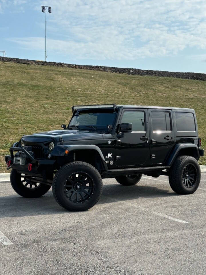 2015 Jeep Wrangler Unlimited for sale at GHOST AUTOWERKZ in Northbrook, IL