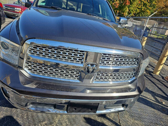 2014 Ram 1500 for sale at L & T Auto Sales & Svc in Campbell, OH