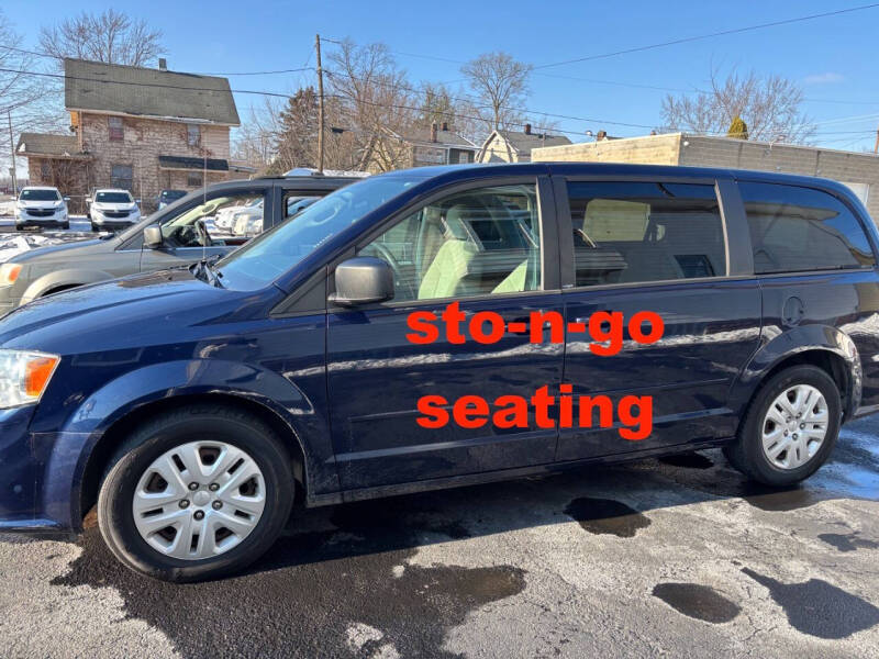 2014 Dodge Grand Caravan for sale at E & A Auto Sales in Warren OH