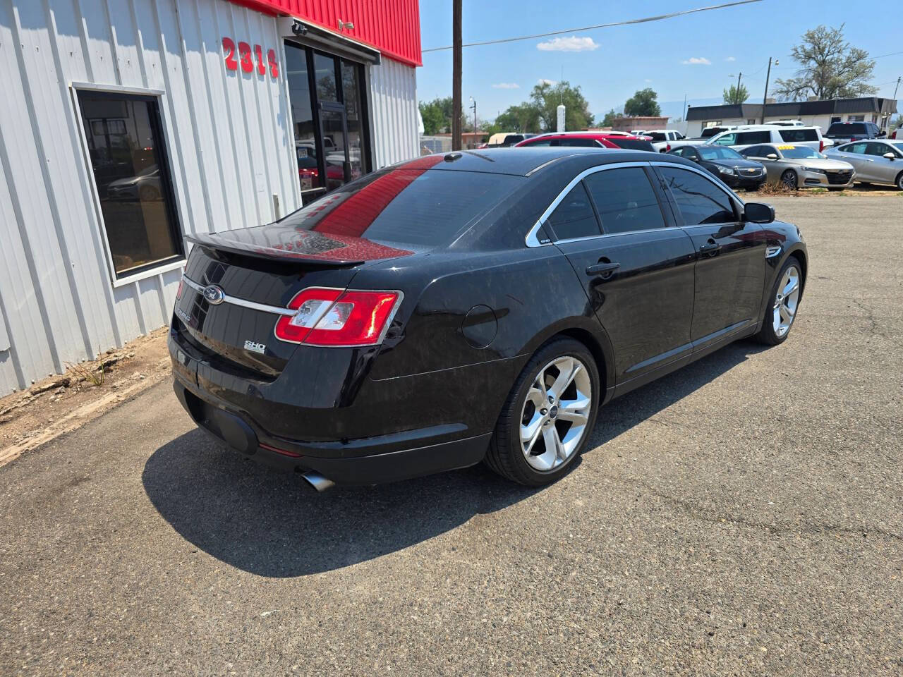 Black 2012 Ford Taurus SHO AWD SHO 4dr Sedan 2