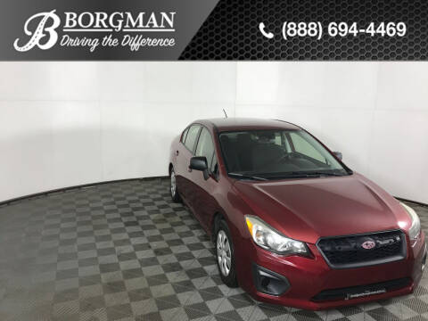 2014 Subaru Impreza for sale at BORGMAN OF HOLLAND LLC in Holland MI