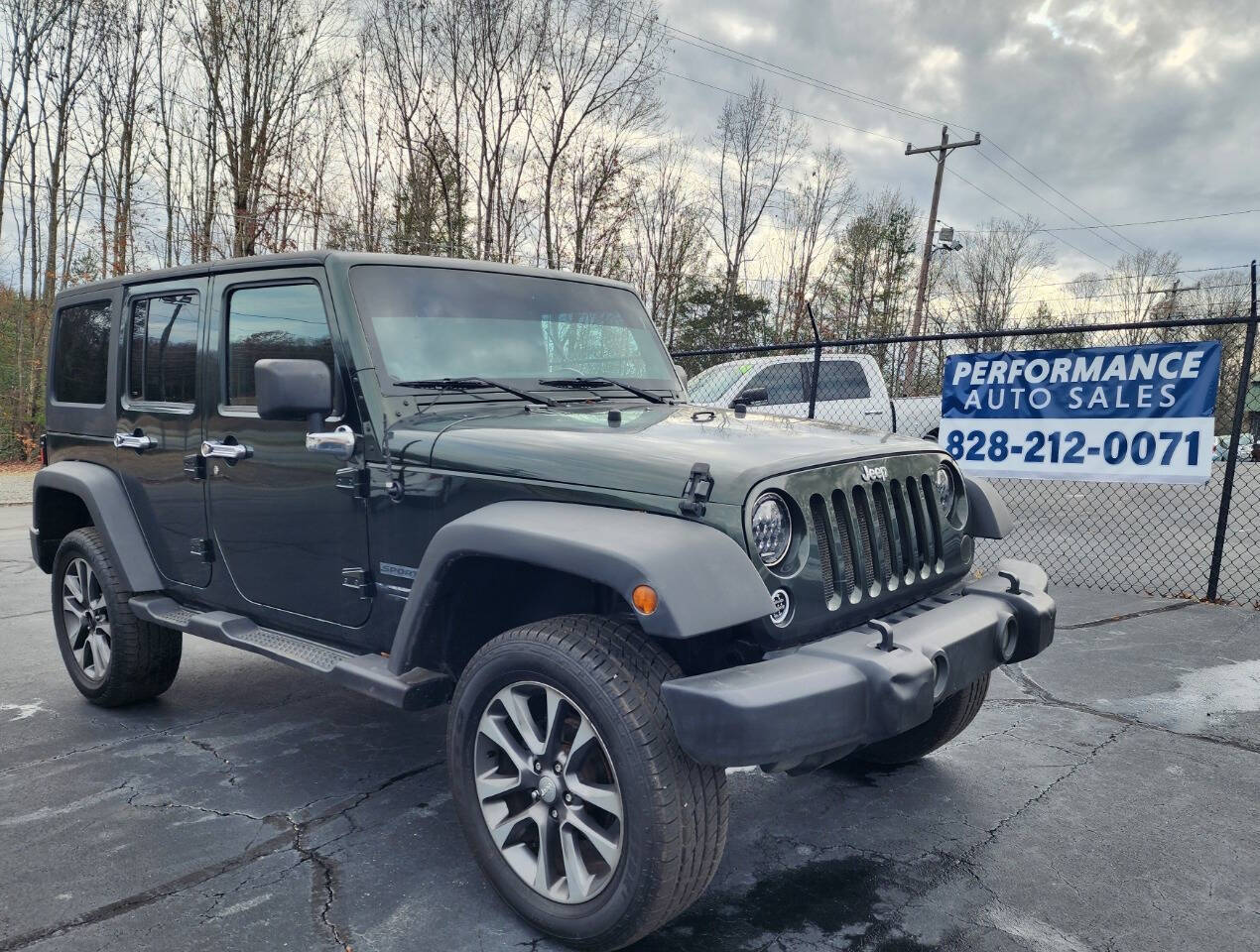 2011 Jeep Wrangler Unlimited for sale at Performance Auto Sales in Hickory, NC