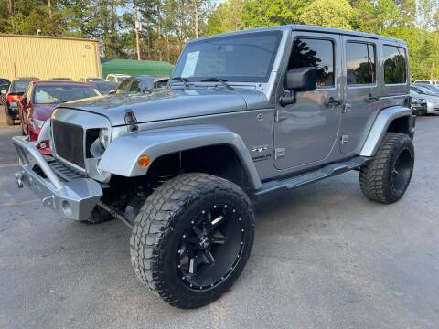 2017 Jeep Wrangler Unlimited for sale at GEORGIA AUTO DEALER, LLC in Buford GA