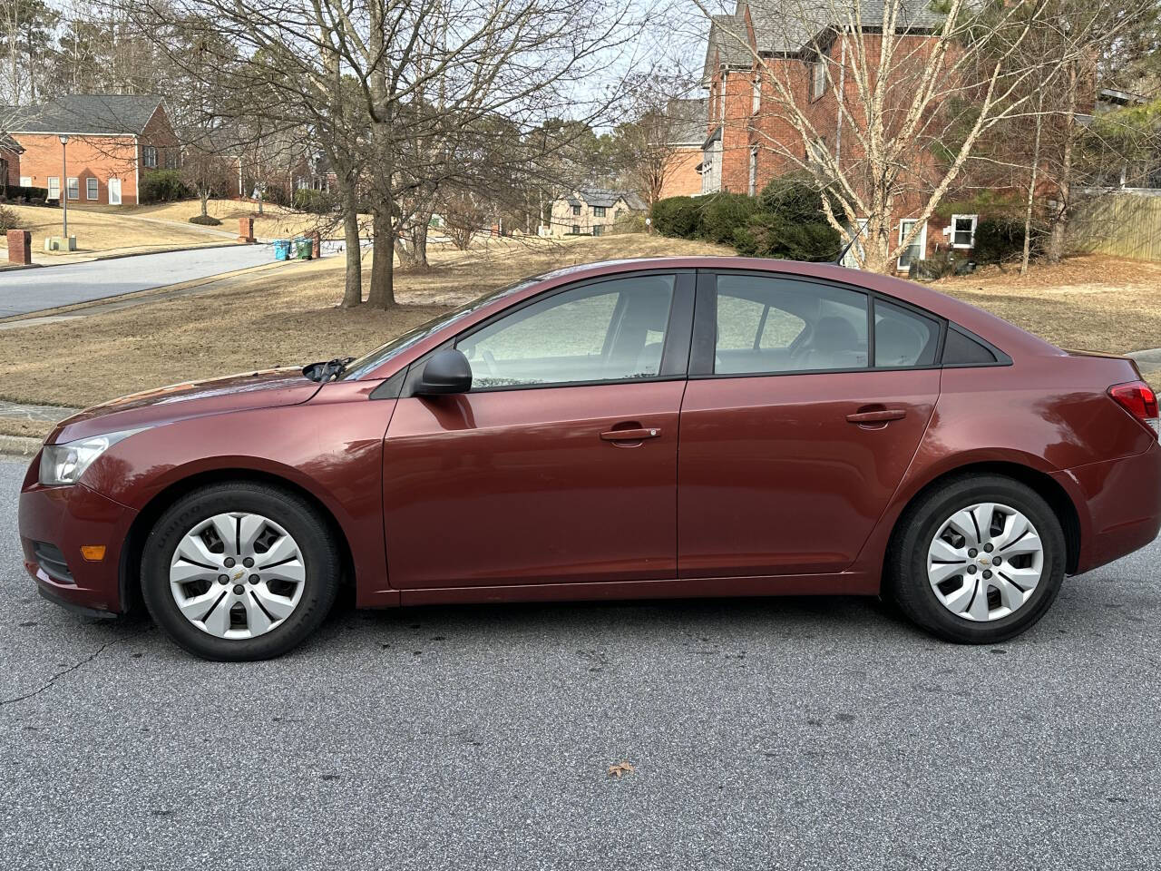 2013 Chevrolet Cruze for sale at SHURE AUTO SALES in Snellville, GA