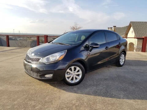 2015 Kia Rio for sale at Austin Auto Planet LLC in Austin TX