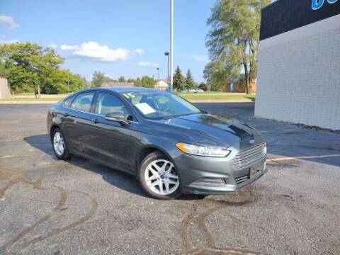 2015 Ford Fusion for sale at Lasco of Grand Blanc in Grand Blanc MI