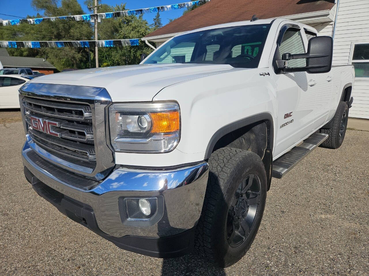 2015 GMC Sierra 2500HD for sale at DANGO AUTO SALES in HOWARD CITY, MI